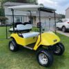 Yellow Ezgo TXT Electric custom golf cart