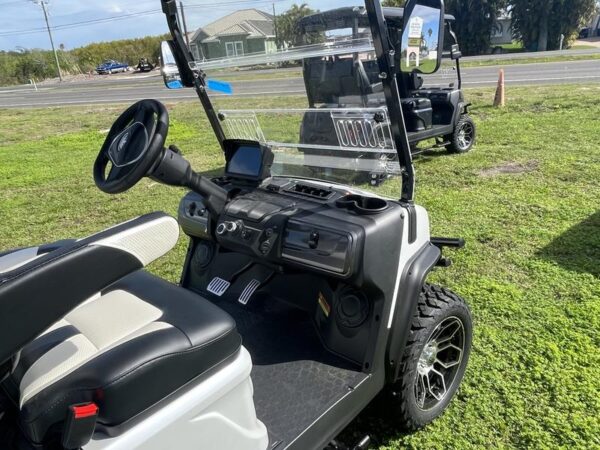 White 2025 Evolution Electric Vehicles D5-Maverick 6 Plus. - Image 6